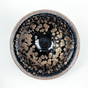 tenmoku-glaze-cup-tea-brewing-porcelain-top.png