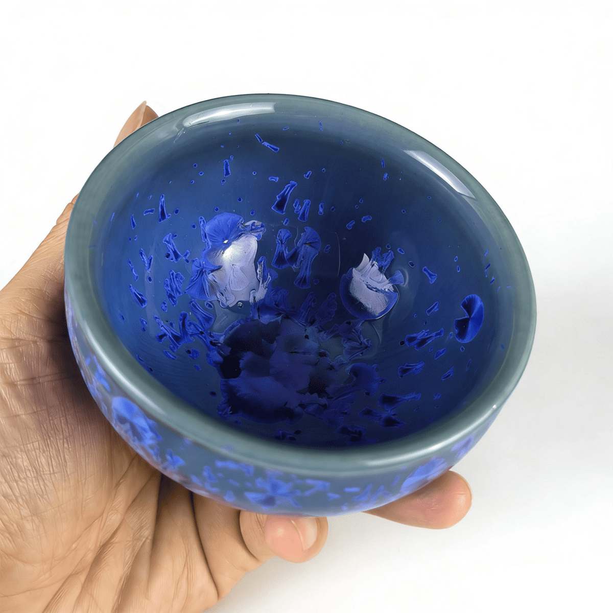tenmoku-glaze-cup-tea-blue-inhand.png tenmoku-glaze-cup-tea-blue-inhand.png