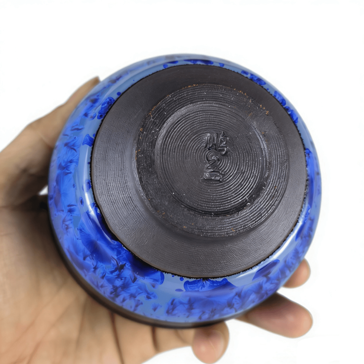 tenmoku-glaze-cup-tea-blue-onhand.png tenmoku-glaze-cup-tea-blue-onhand.png