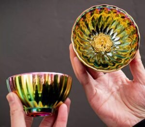 porcelain-tea-cups-iridescen-in-hand.jpg