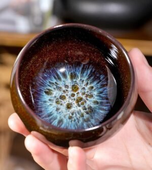 porcelain-tea-cups​-sand-gold-blue-inhand