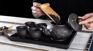 porcelain-tea-cups​-set​-yixing-teapot-handmade-nightbloom-oracle-pour.jpg