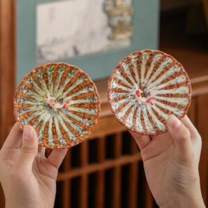 tenmoku-glaze-porcelain-tea-cups-golden-fish-whiteinhand.jpg