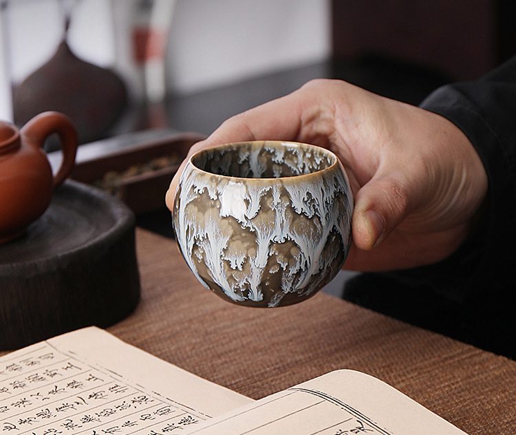 tenmoku-glaze-porcelain-tea-cups-spindrift-inhand tenmoku-glaze-porcelain-tea-cups-spindrift-inhand