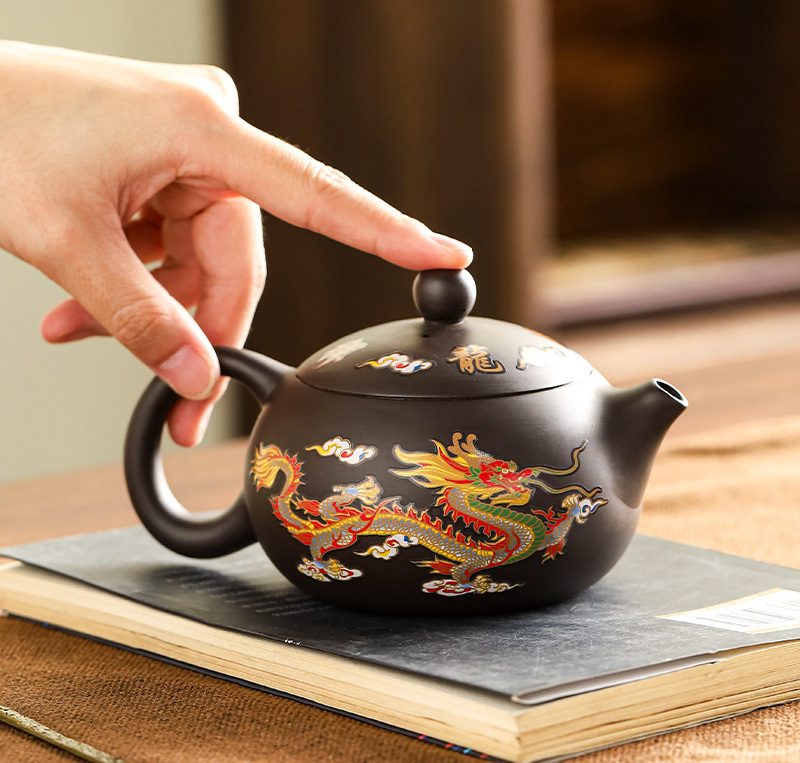 vintage-brown-teapot-chinese-color changing dragon and phoenix-ondesk