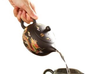 vintage-brown-teapot-chinese-color changing dragon and phoenix-pour