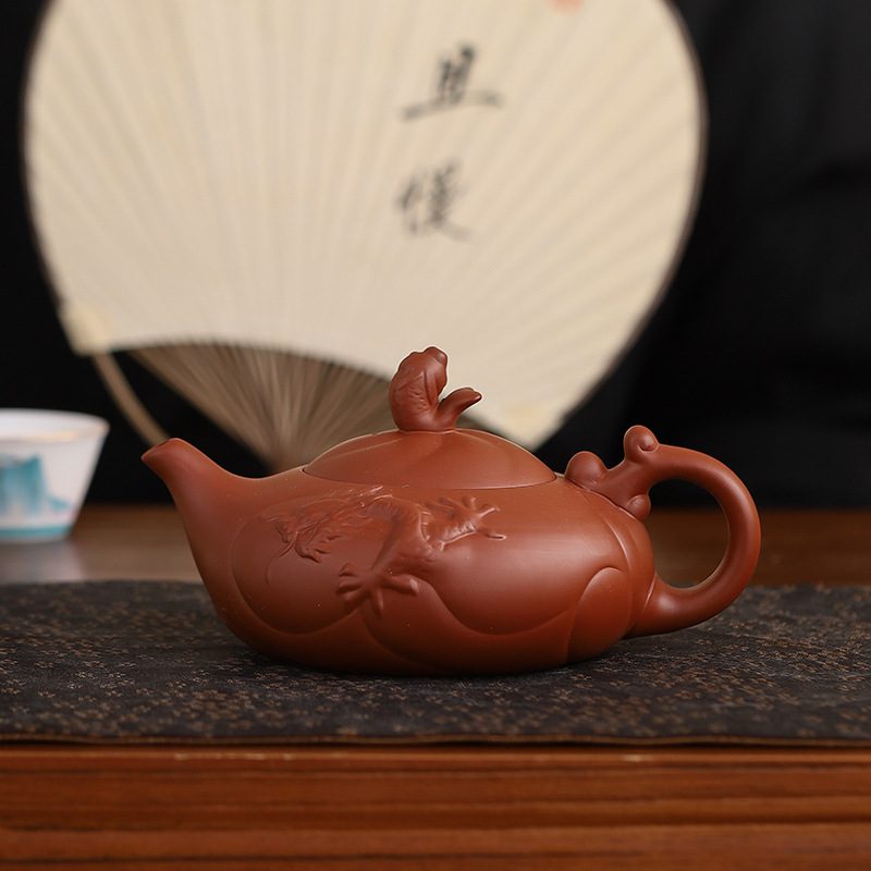 vintage-brown-teapot-chinese-prosperity-dragon-leftone.jpg vintage-brown-teapot-chinese-prosperity-dragon-leftone.jpg