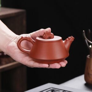 vintage-brown-teapot-chinese-yixing-clay-cloud-dragon-inhand.jpg
