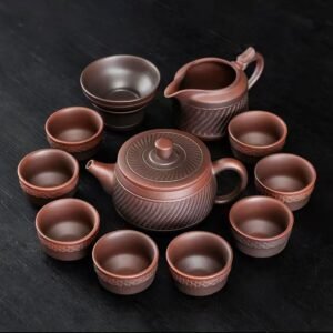 vintage brown teapot-yixing-purple-clay-ensemble-moments-background-black