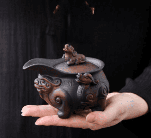 vintage brown teapot-yixing-purple-clay-qilin-on hand